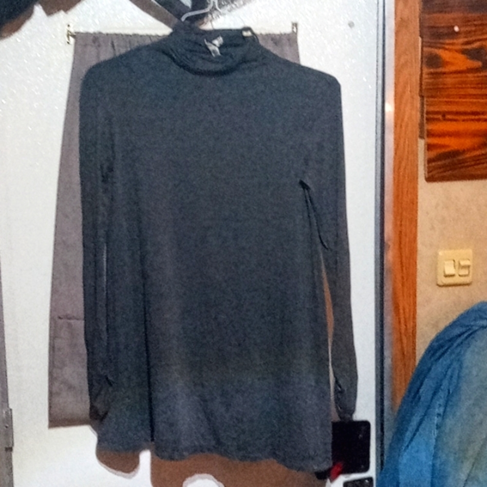 Grey, stretchy ,long sleeve, light wear.